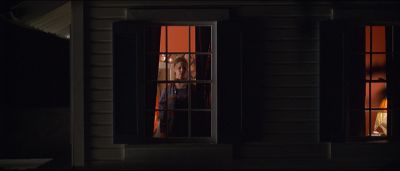 Still from American Beauty (1999) that has been tagged with: window & wide shot & exterior & night