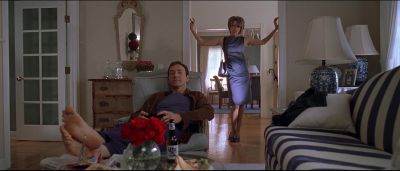 Still from American Beauty (1999) that has been tagged with: 6e1c1c & exterior & two-shot & wide shot & doorway