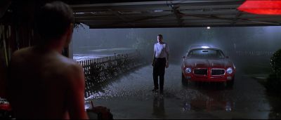 Still from American Beauty (1999) that has been tagged with: rain & garage