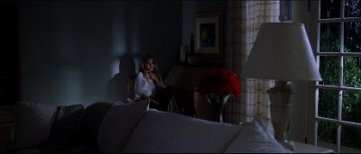 Still from American Beauty (1999) that has been tagged with: clean single & night & couch & living room & wide shot