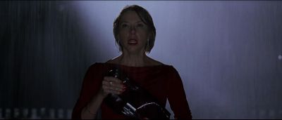 Still from American Beauty (1999) that has been tagged with: rain & night & exterior & medium shot