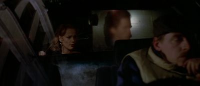 Still from American Psycho (2000) that has been tagged with: 000000 & car interior & backseat & interior