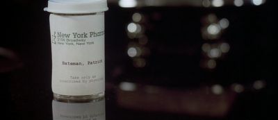 Still from American Psycho (2000) that has been tagged with: interior & medicine & extreme close-up