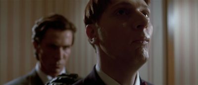 Still from American Psycho (2000) that has been tagged with: night & murder & two-shot & close-up