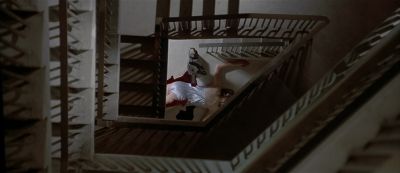 Still from American Psycho (2000) that has been tagged with: night & wide shot & overhead & interior & gore & dead body