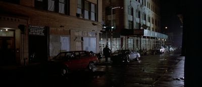 Still from American Psycho (2000) that has been tagged with: street & exterior & wide shot & night