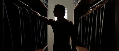 Still from American Psycho (2000) that has been tagged with: clean single & day & closet & medium wide & interior