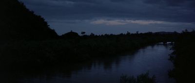 Still from Apocalypse Now (1979) that has been tagged with: river & extreme wide & night