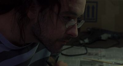 Still from Being John Malkovich (1999) that has been tagged with: glasses