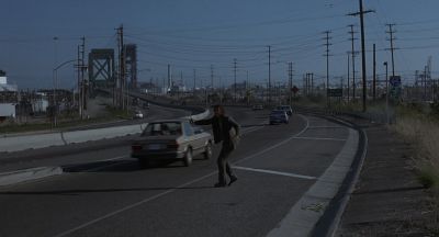 Still from Being John Malkovich (1999) that has been tagged with: wide shot & day & highway