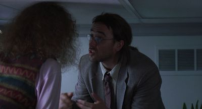 Still from Being John Malkovich (1999) that has been tagged with: office & over-the-shoulder & two-shot & day & medium shot