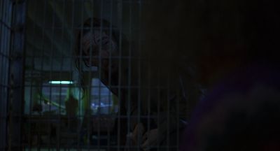 Still from Being John Malkovich (1999) that has been tagged with: over-the-shoulder & fluorescent light & cage