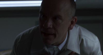 Still from Being John Malkovich (1999) that has been tagged with: bcd4e6 & interior & clean single & medium close-up