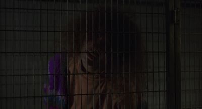 Still from Being John Malkovich (1999) that has been tagged with: medium close-up & night & cage & clean single & interior