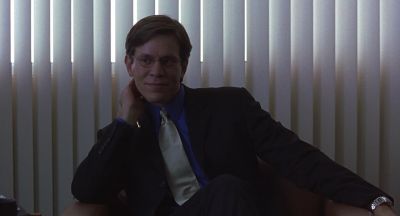 Still from Being John Malkovich (1999) that has been tagged with: blinds & medium shot & office