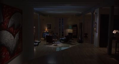 Still from Being John Malkovich (1999) that has been tagged with: living room & establishing shot
