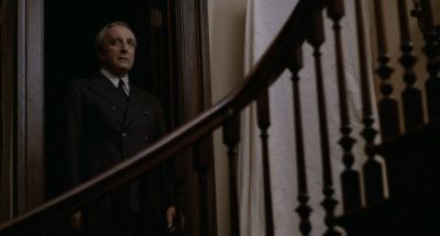 Still from Being There (1979) that has been tagged with: interior & medium shot & clean single & low-angle