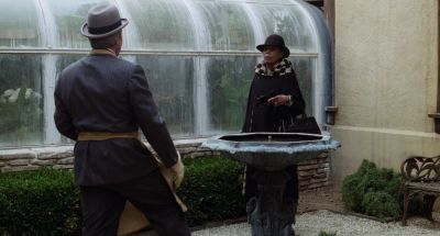 Still from Being There (1979) that has been tagged with: 0f0f0f & exterior & over-the-shoulder & two-shot & day