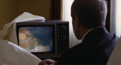 Still from Being There (1979) that has been tagged with: over-the-shoulder & tv & watching tv