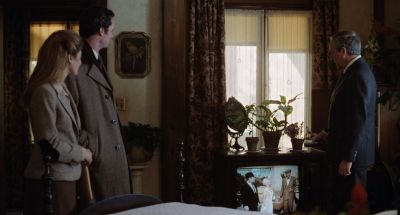 Still from Being There (1979) that has been tagged with: three-shot & day & medium wide & interior