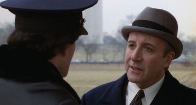 Still from Being There (1979) that has been tagged with: two-shot & day & police