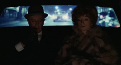 Still from Being There (1979) that has been tagged with: car interior & car & night & backseat