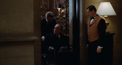 Still from Being There (1979) that has been tagged with: night & wheelchair & interior