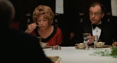 Still from Being There (1979) that has been tagged with: medium shot & dinner & three-shot