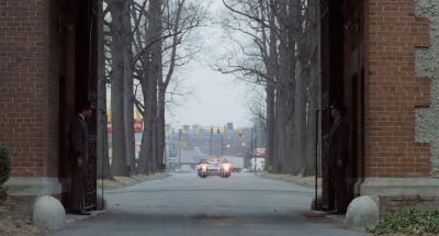 Still from Being There (1979) that has been tagged with: wide shot & motorcycle & day