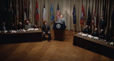 Still from Being There (1979) that has been tagged with: flag & american flag & group-shot