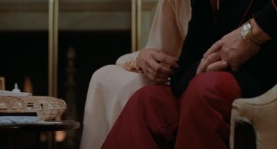 Still from Being There (1979) that has been tagged with: interior & night & holding hands