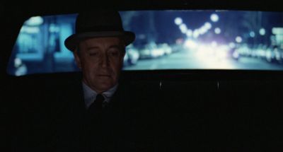 Still from Being There (1979) that has been tagged with: car & backseat & medium shot & night