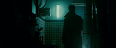 Still from Blade Runner (1982) that has been tagged with: wide shot & bathroom & over-the-shoulder & clean single & night