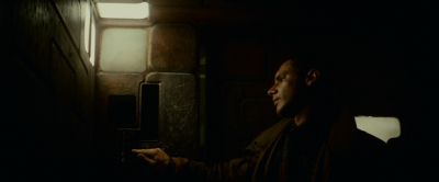 Still from Blade Runner (1982) that has been tagged with: medium shot & clean single & day