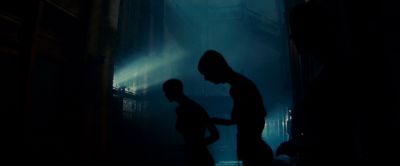 Still from Blade Runner (1982) that has been tagged with: god rays & two-shot & night