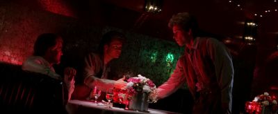 Still from Boogie Nights (1997) that has been tagged with: medium wide & club & bar & interior & night