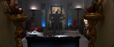 Still from Boogie Nights (1997) that has been tagged with: interior & wide shot & living room