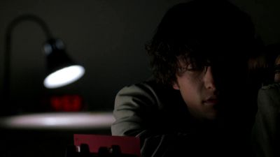Still from Brick (2005) that has been tagged with: 000000 & interior & desk lamp & close-up