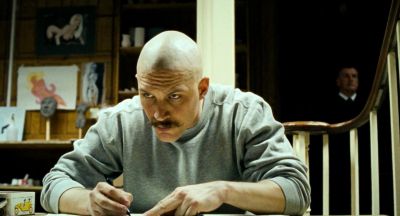 Still from Bronson (2008) that has been tagged with: writing & medium shot