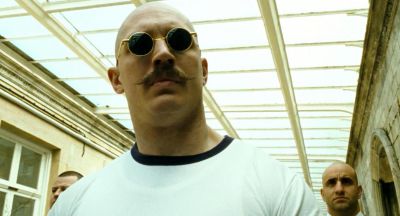 Still from Bronson (2008) that has been tagged with: low-angle & medium close-up & clean single & day & interior