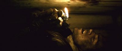 Still from Buried (2010) that has been tagged with: 3d2b1f & lighter