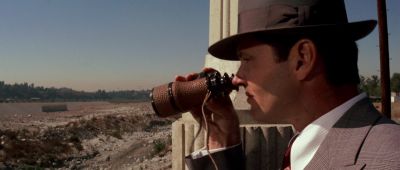Still from Chinatown (1974) that has been tagged with: 4a3621 & peeking & binoculars & aqueduct