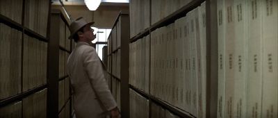 Still from Chinatown (1974) that has been tagged with: medium wide & looking up & clean single & day