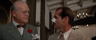 Still from Chinatown (1974) that has been tagged with: medium close-up & day
