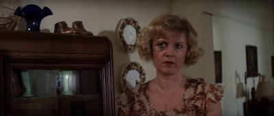Still from Chinatown (1974) that has been tagged with: clean single & medium close-up & living room