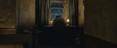 Still from Cloud Atlas (2012) that has been tagged with: over-the-shoulder & night & practical lamp & desk