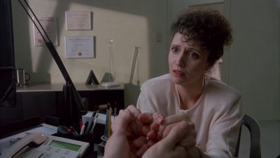 Still from Dead Ringers (1988) that has been tagged with: hands & medium shot & interior