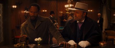Still from Django Unchained (2012) that has been tagged with: 7e461b & medium wide & night
