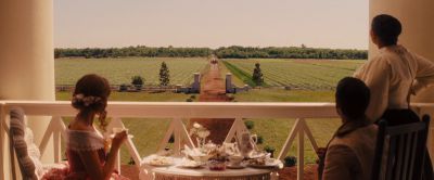 Still from Django Unchained (2012) that has been tagged with: wide shot & over-the-shoulder & field