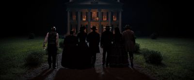 Still from Django Unchained (2012) that has been tagged with: b38a6b & night & over-the-shoulder & wide shot